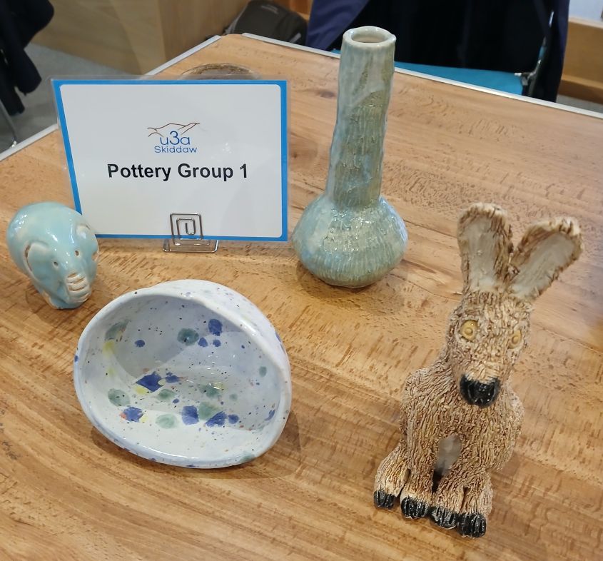 Vase, elephant, rabbit and small bowl hand modelled in clay.